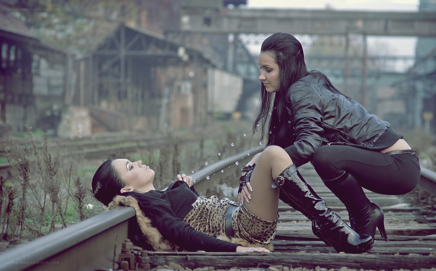 Women on train tracks