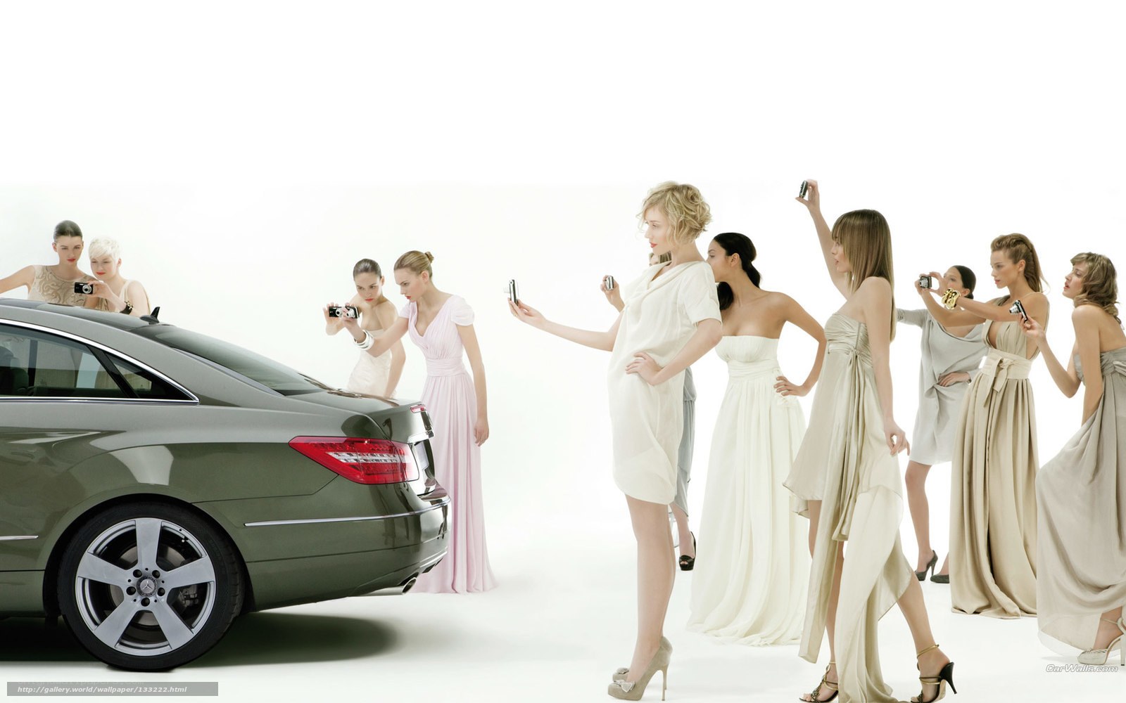 Women photographing a car