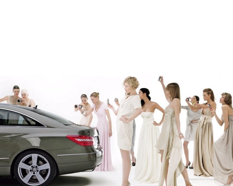 Women photographing a car
