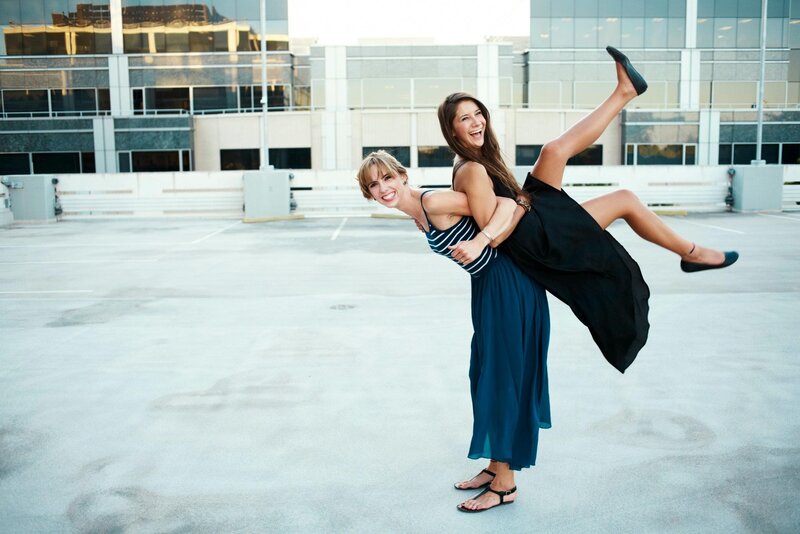 Women playing in parking lot
