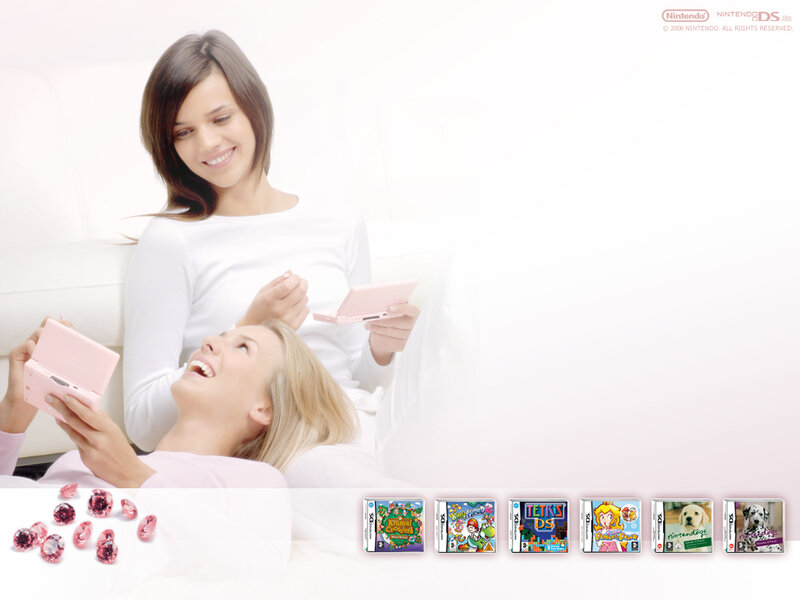 Women playing pink Nintendo DS