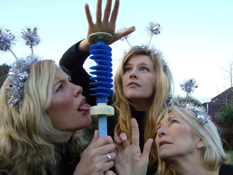 Women playing with a toy