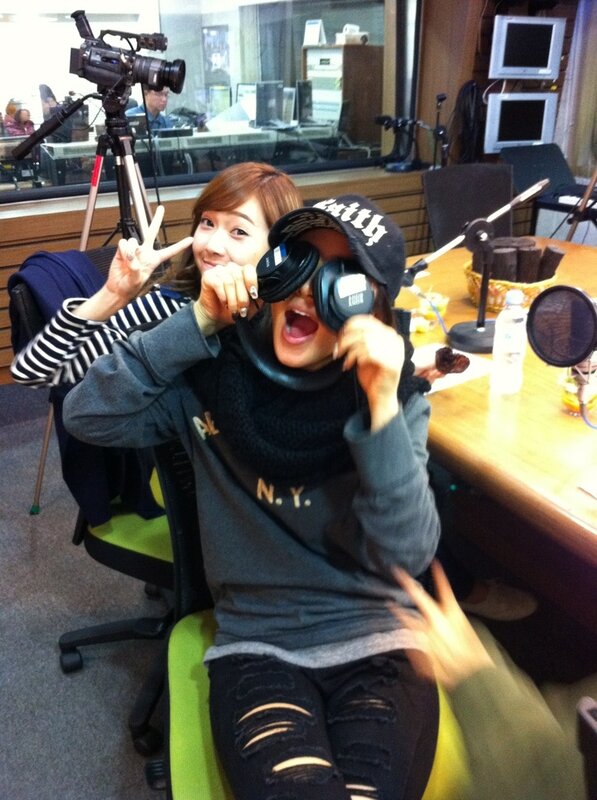 Women posing in a radio studio