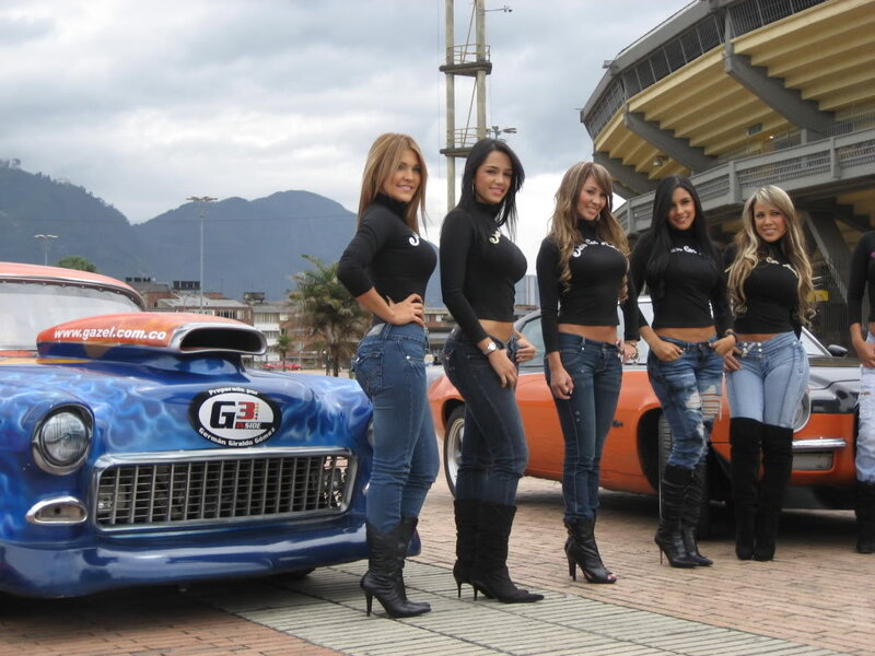 Women Posing with Cars — Blue