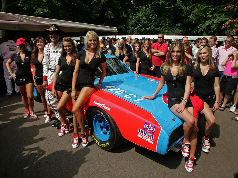 Women Posing with Race Car — Red