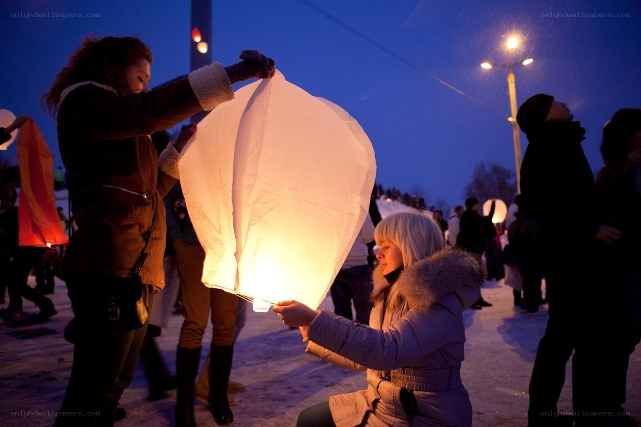 Women preparing a sky lantern