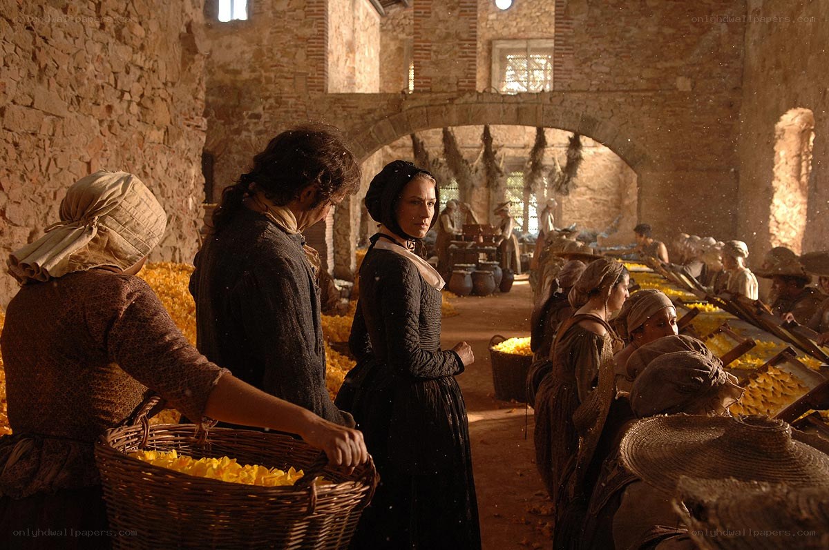 Women processing saffron in a stone hall