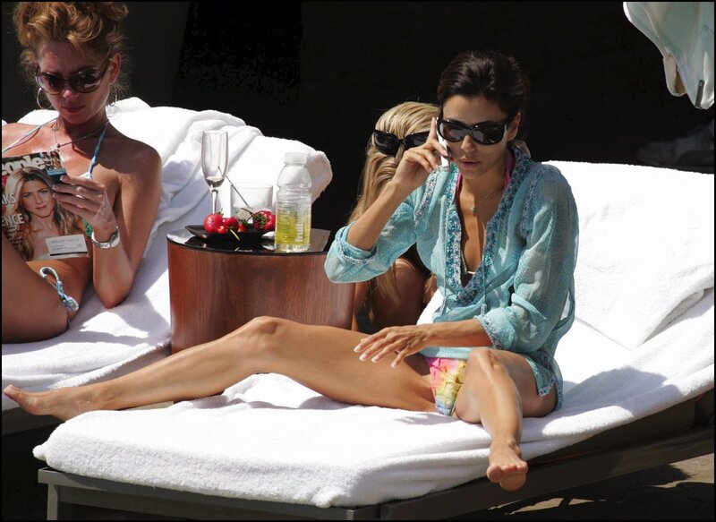 Women relaxing by the pool