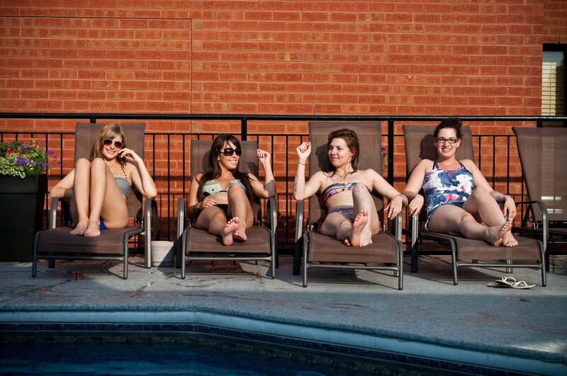 Women relaxing by the pool