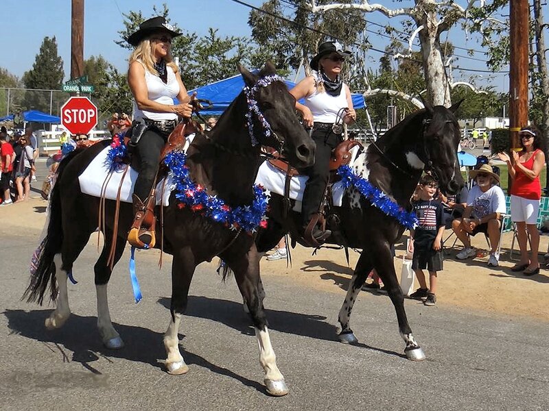 Women Riding Horses — Blue