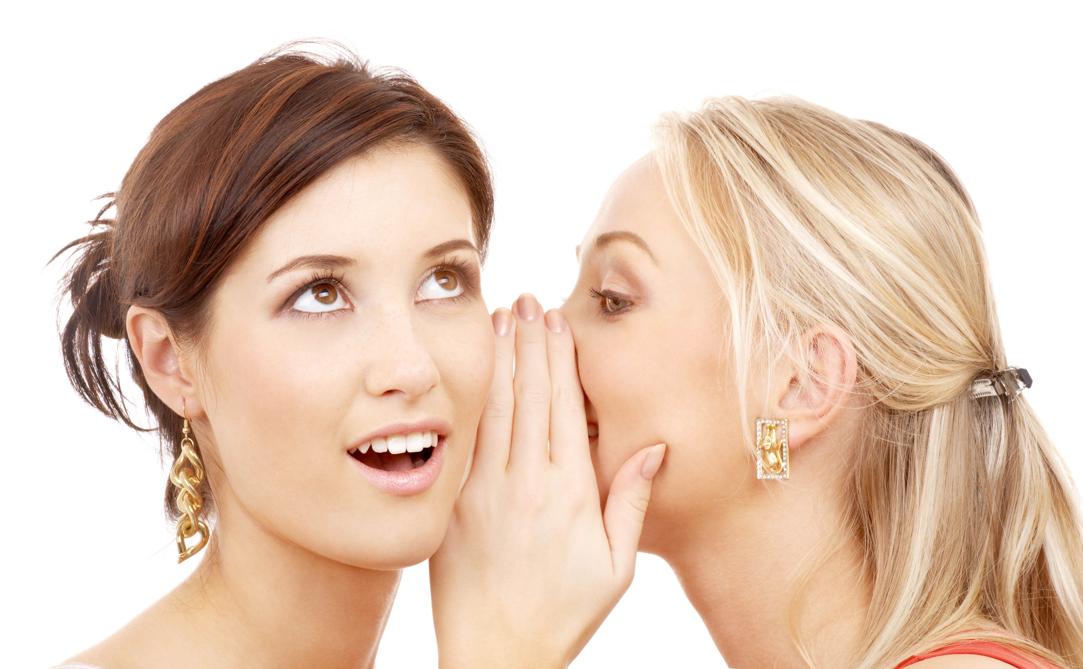 women sharing a secret