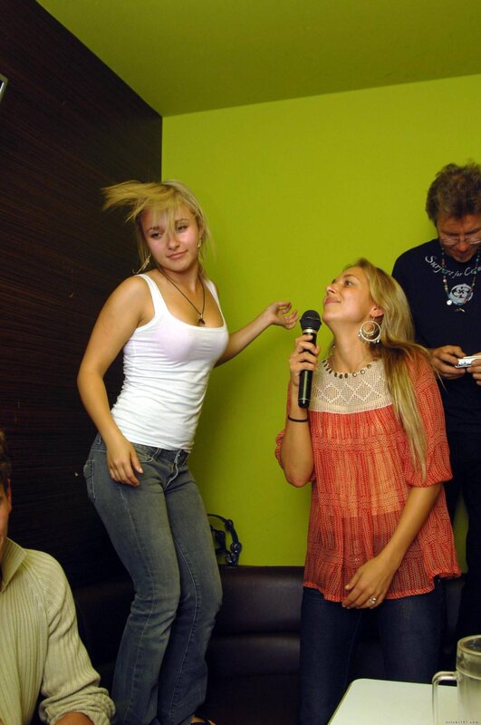 Women singing in a karaoke room