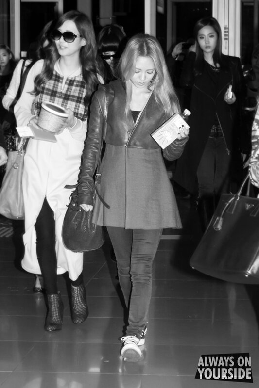women walking in airport