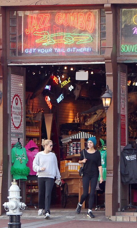 Women walking past a jazz shop