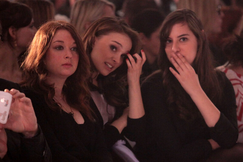 Women watching event in audience