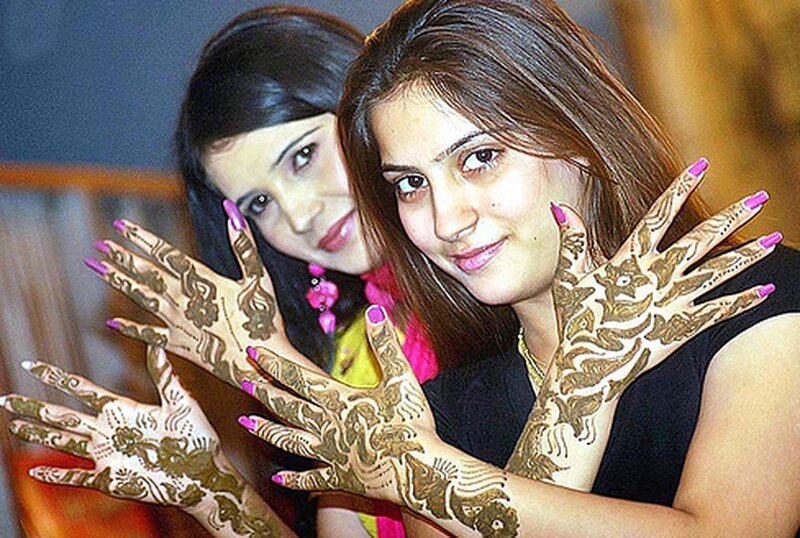 Women with henna designs