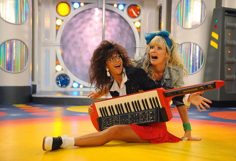 Women with keyboard in futuristic set