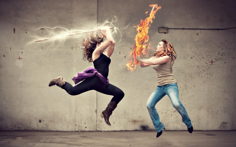 Women with magical weapons in combat