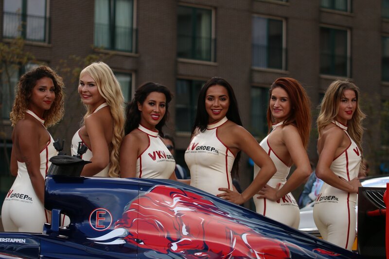Women with Race Car — Blue