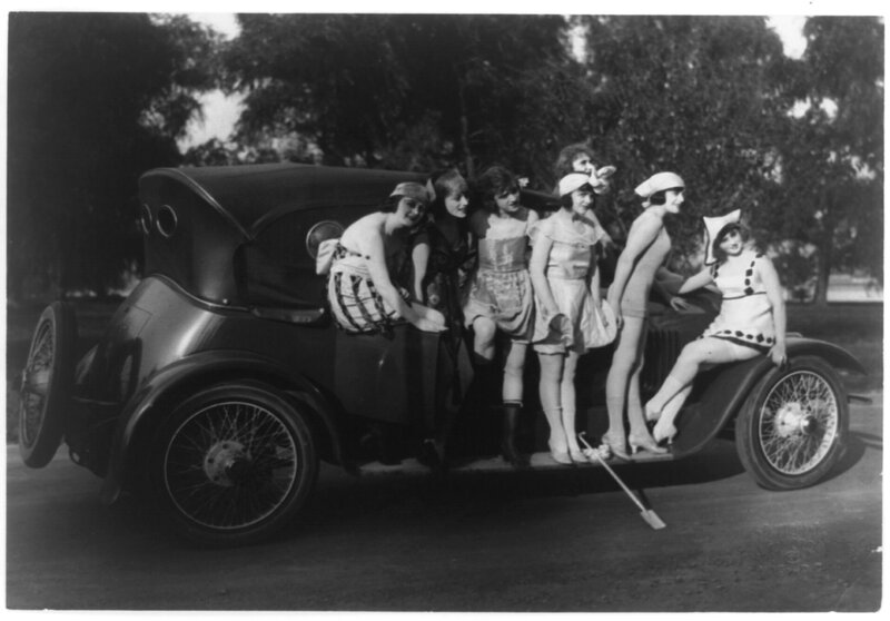 Women with vintage car