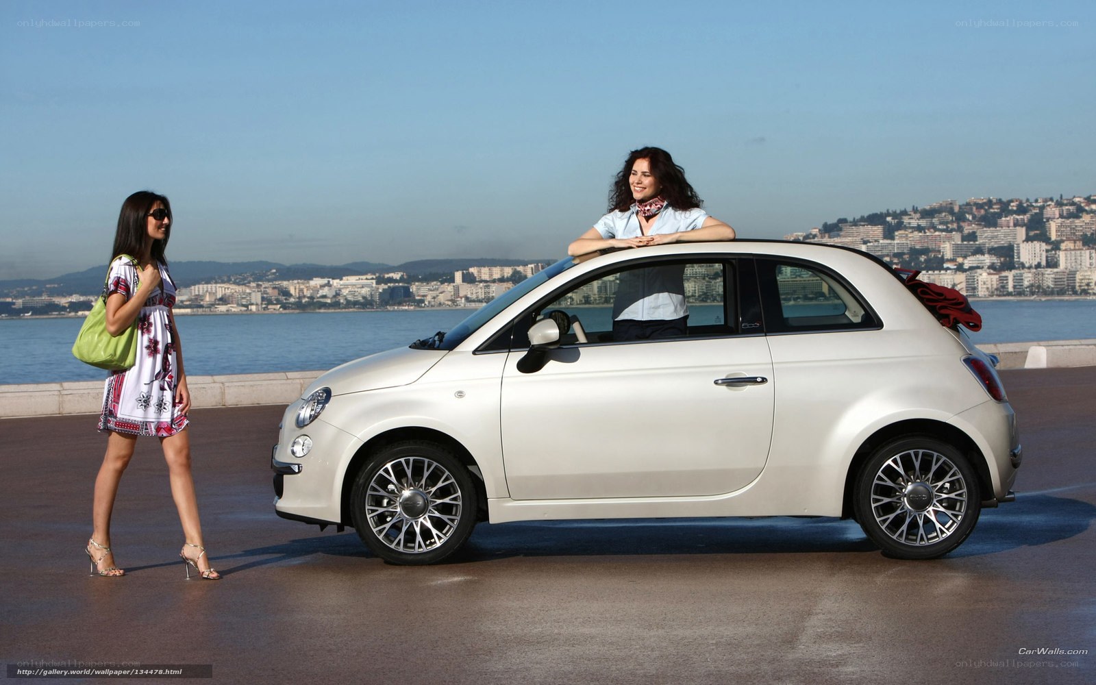 Women with white Fiat 500