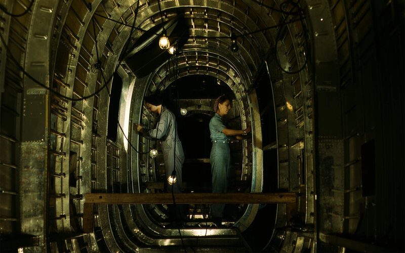 Women working in aircraft fuselage
