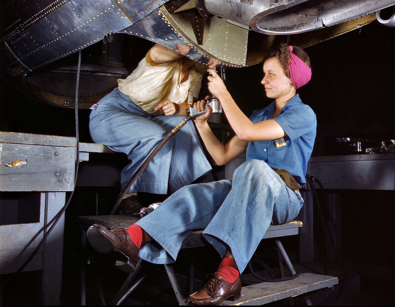 Women working on aircraft