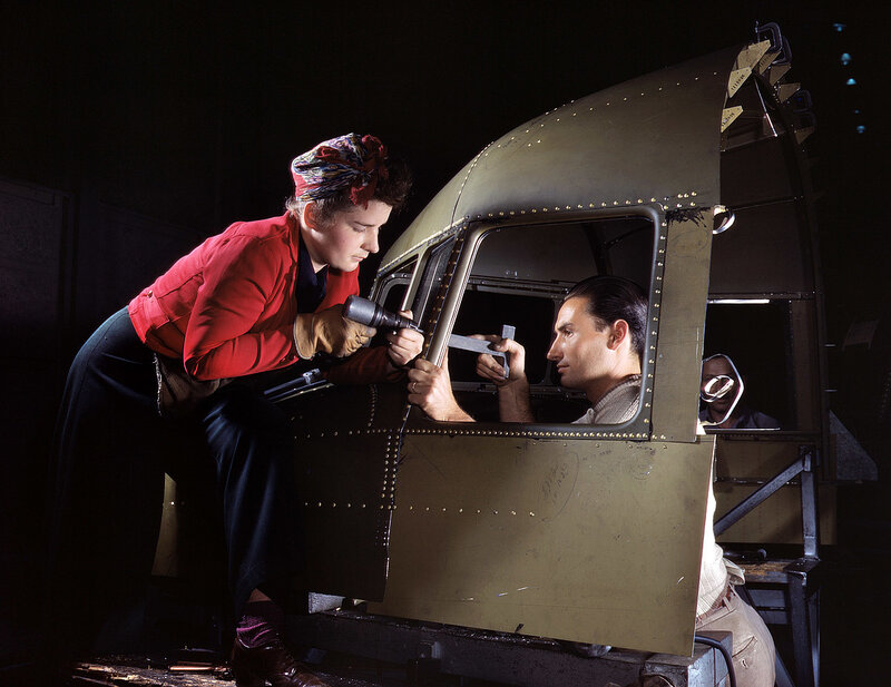 Women working on aircraft assembly