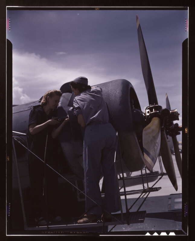 Women working on aircraft engine
