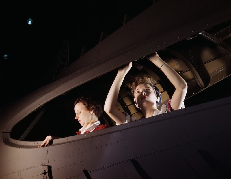 Women working on aircraft