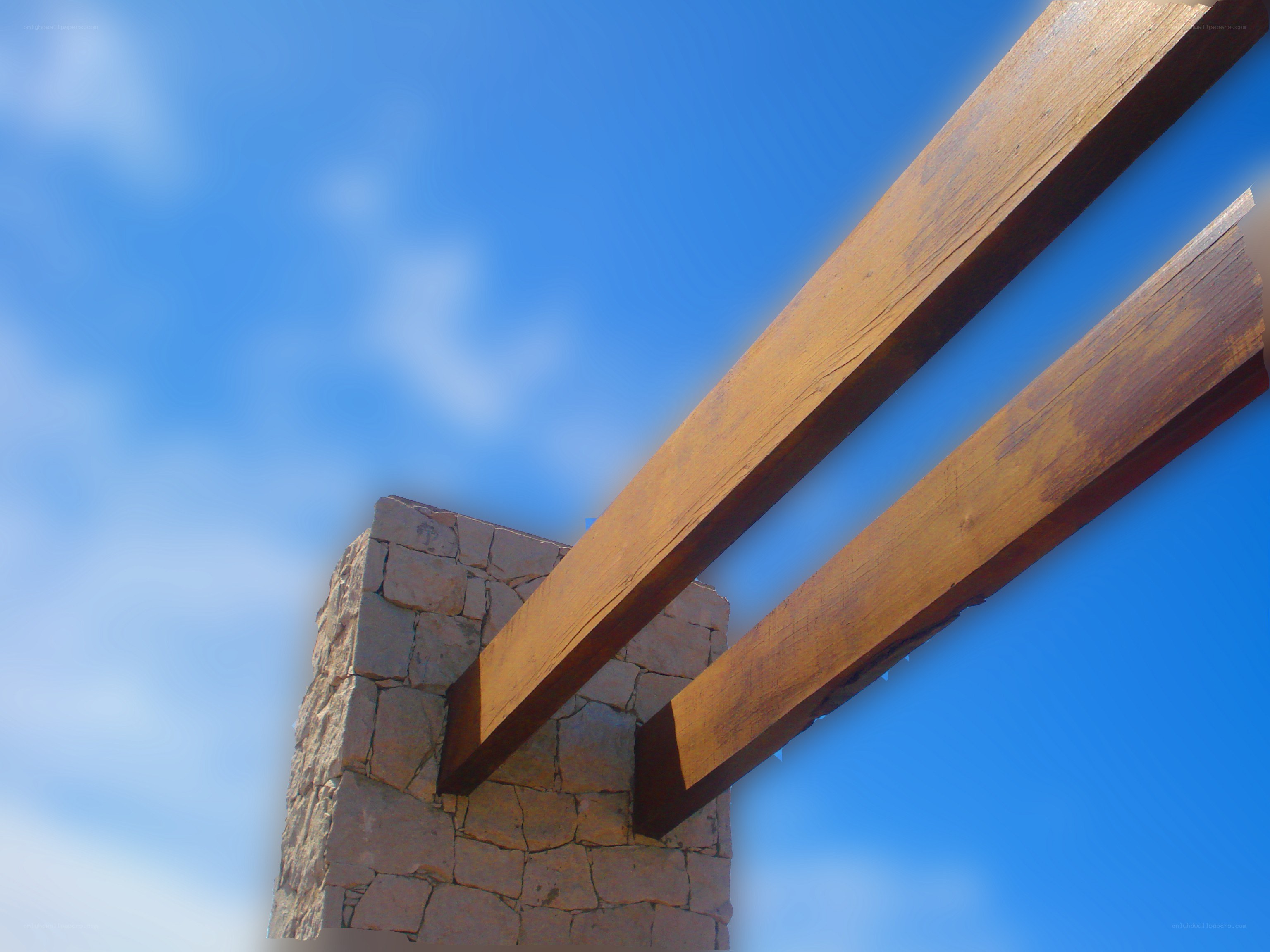 Wood beams on stone pillar