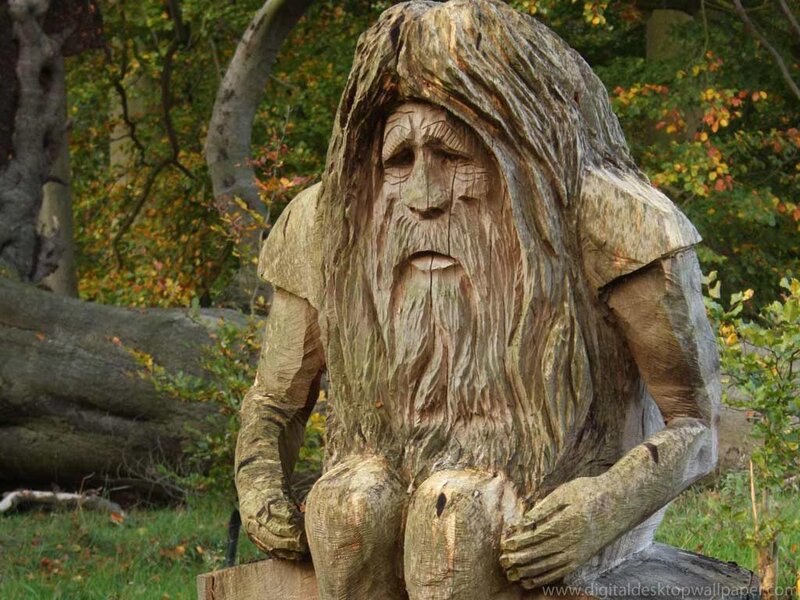 wood carving of a bearded man