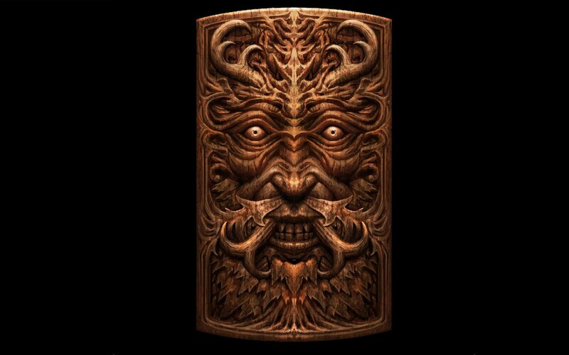 wood carving of a face