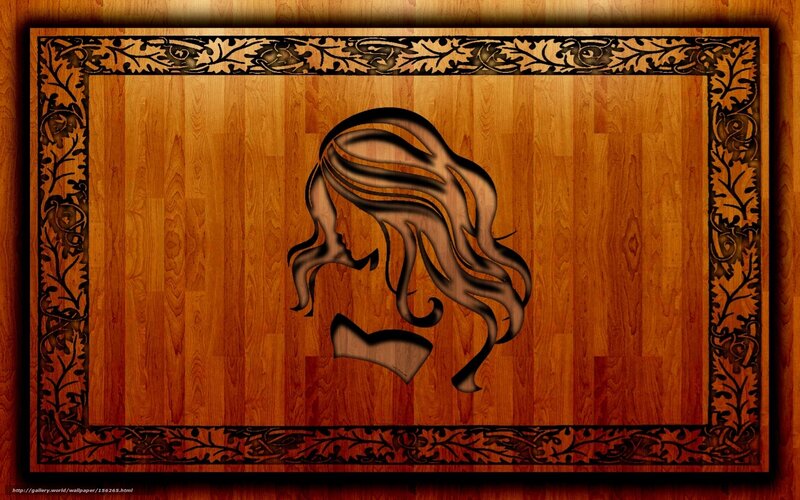 wood carving of woman's profile