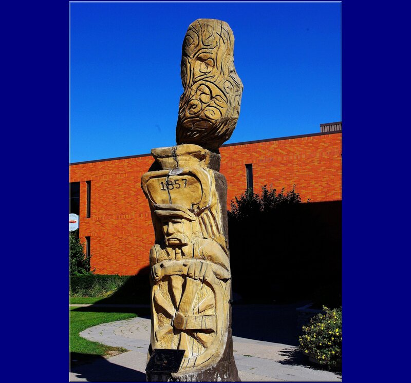wood carving sculpture with date