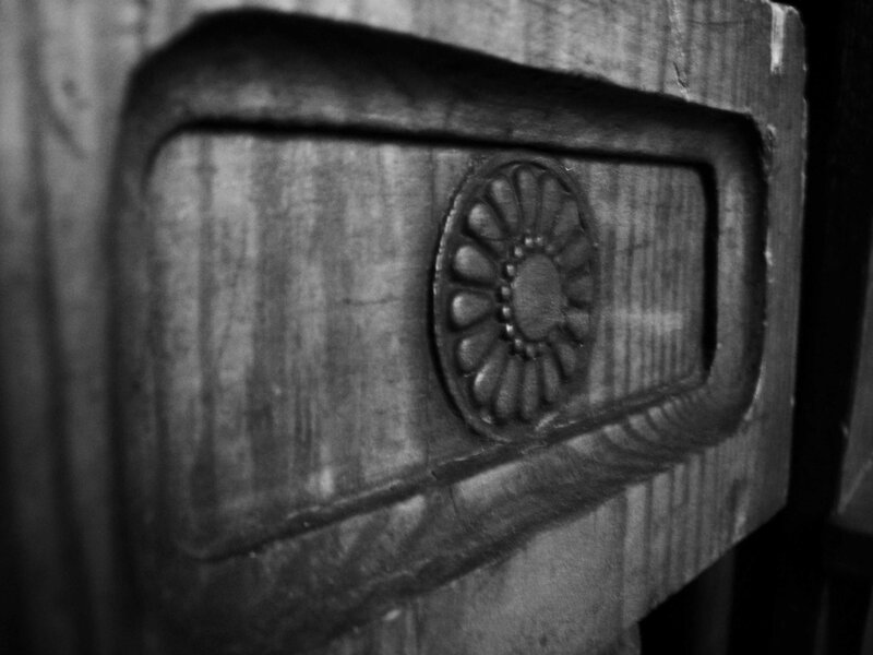 wood carving with floral design