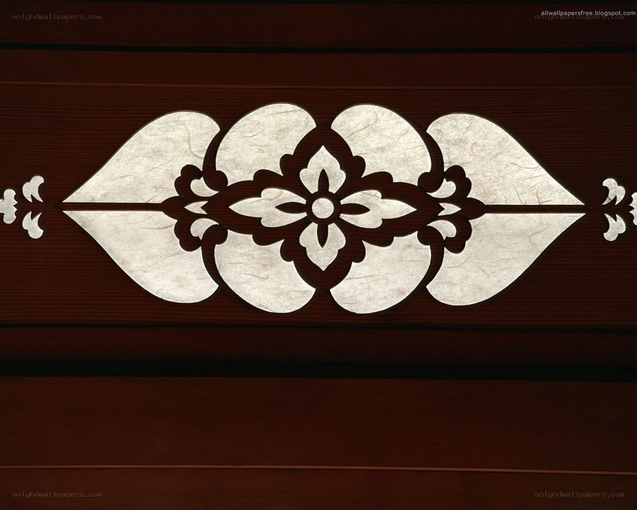 wood carving with floral pattern