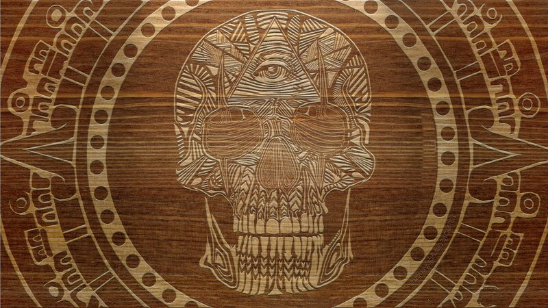 wood carving with skull and eye