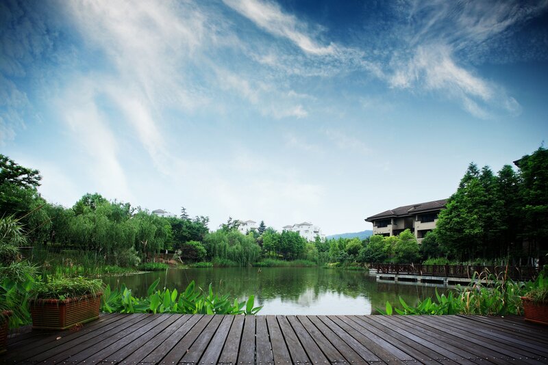 Wood deck by a serene lake
