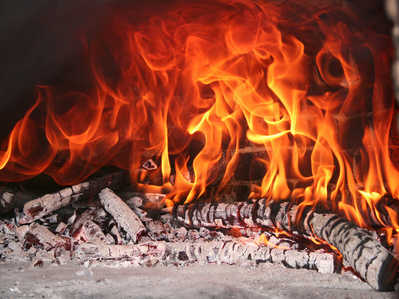 Wood fire burning in a fireplace