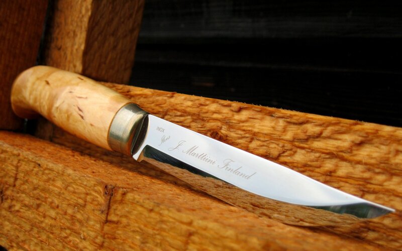 wood-handled knife on wood