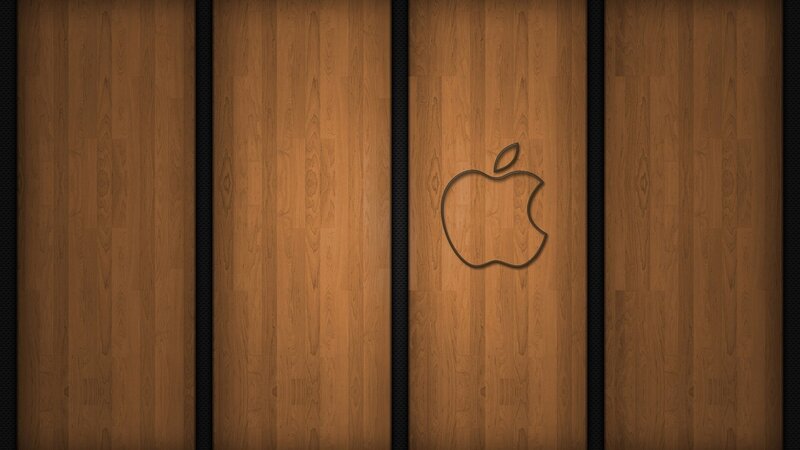 wood panel background with apple logo