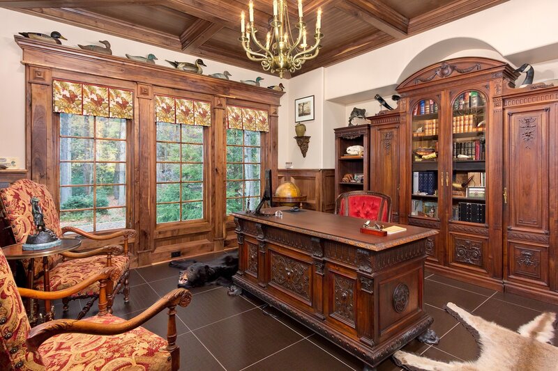 Wood-paneled study with taxidermy
