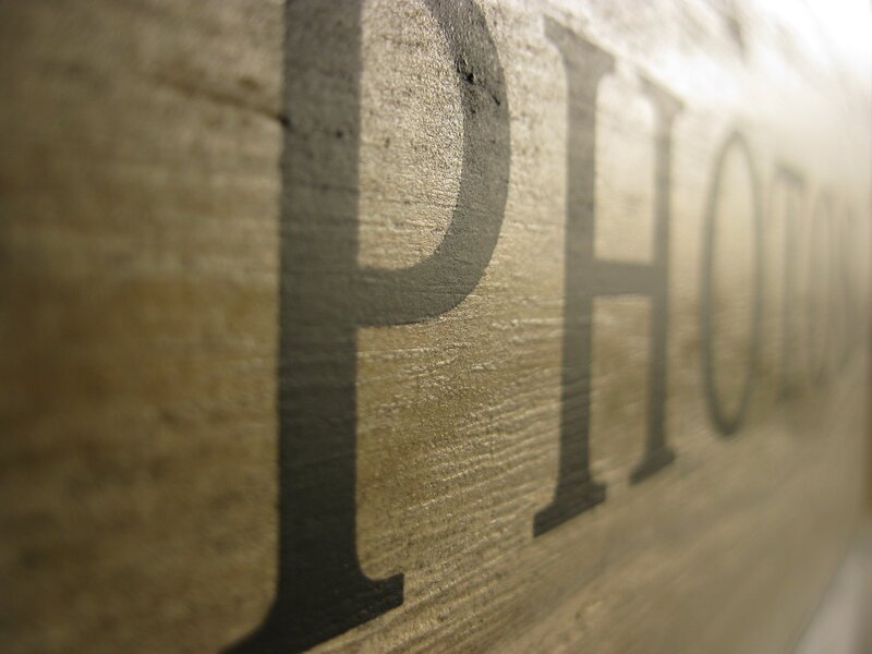 wood sign with photo text