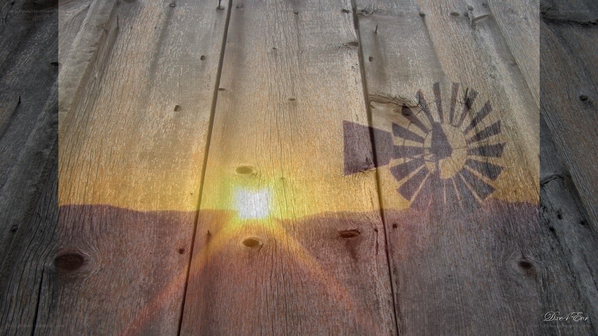 Wood texture with sun and windmill