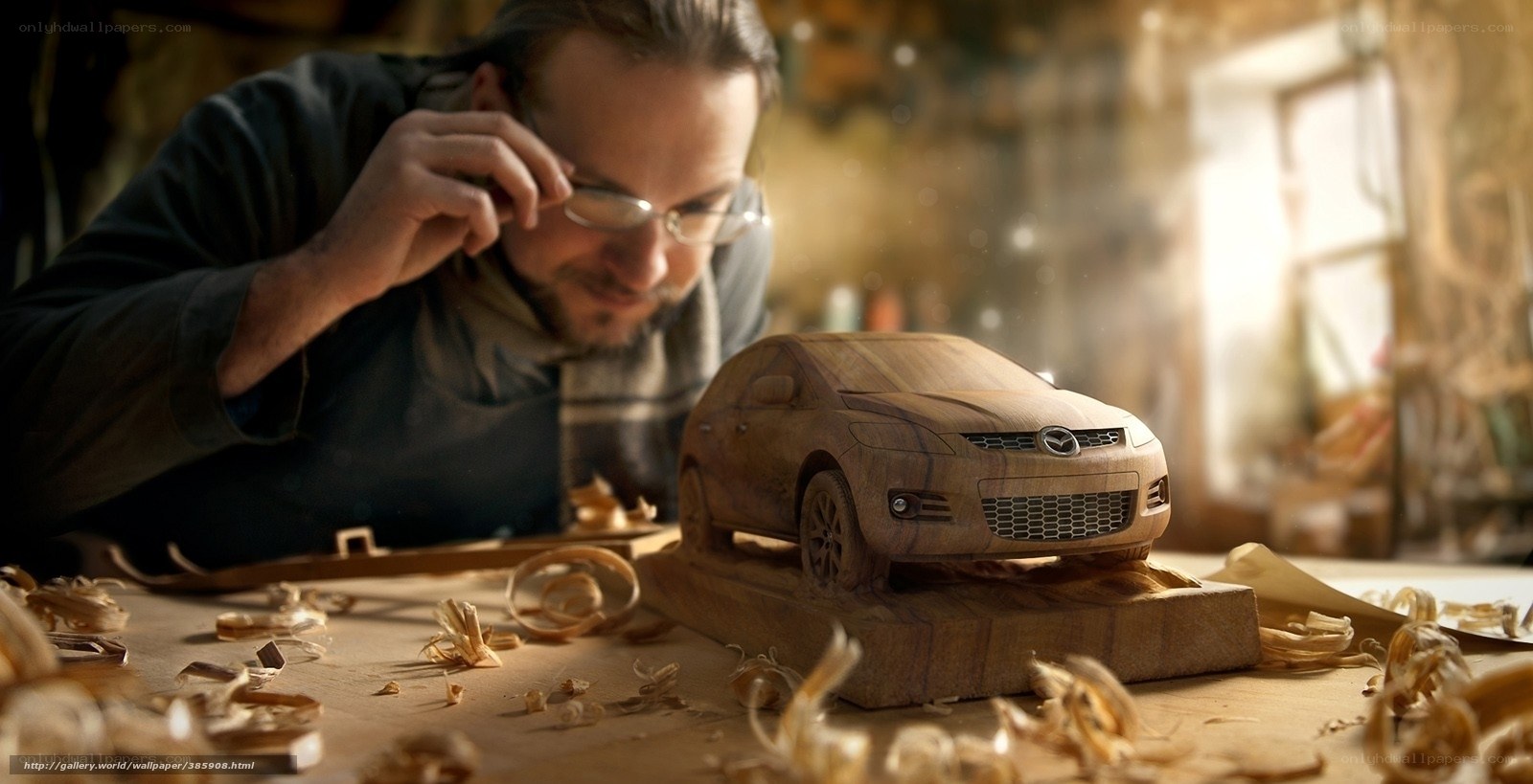 woodcarver with car model