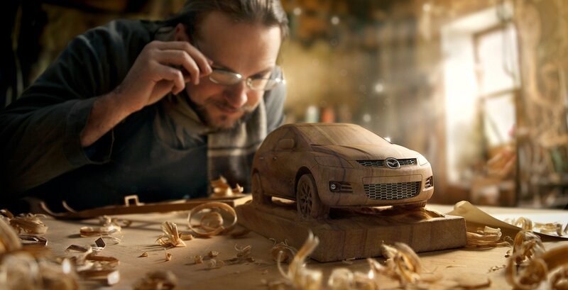 Woodcarver with Wooden Car