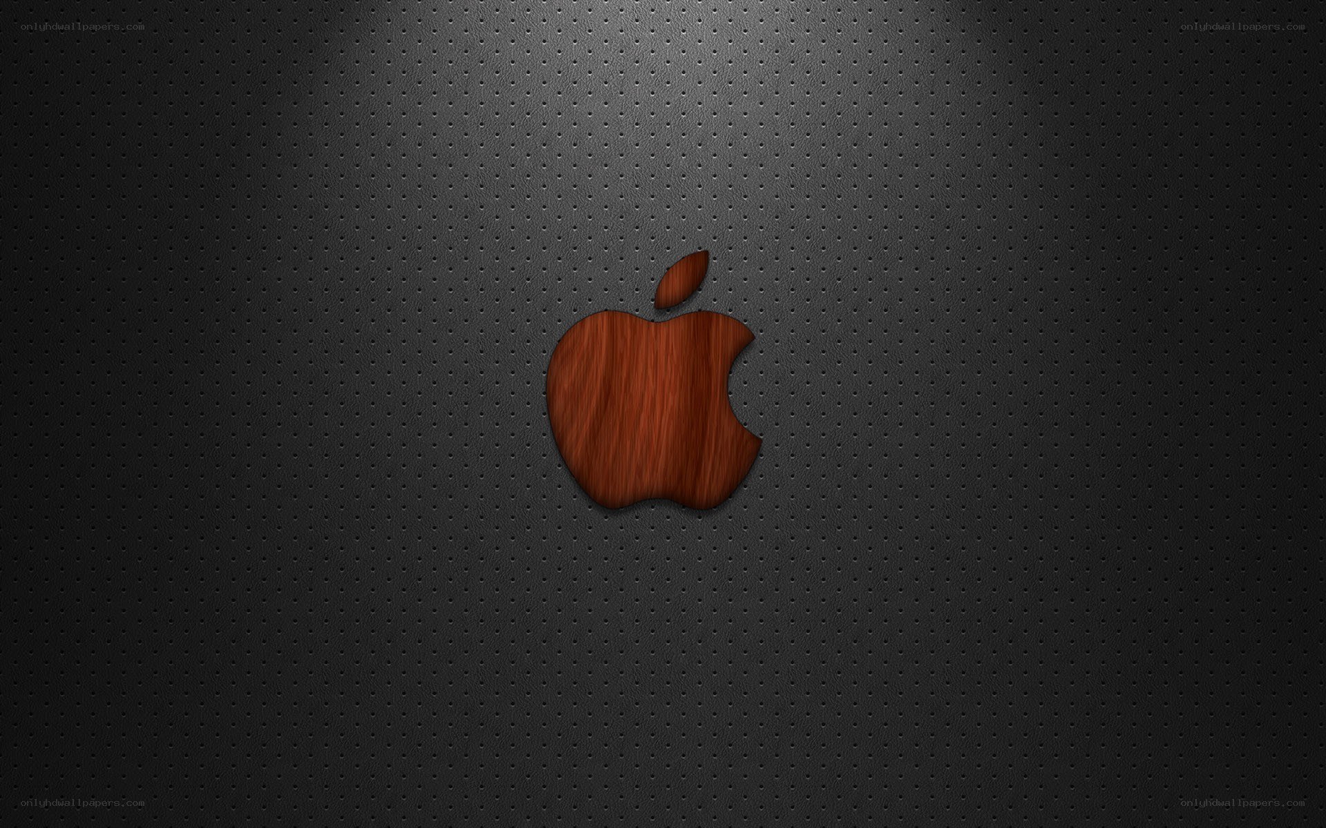 wooden apple logo on dark background