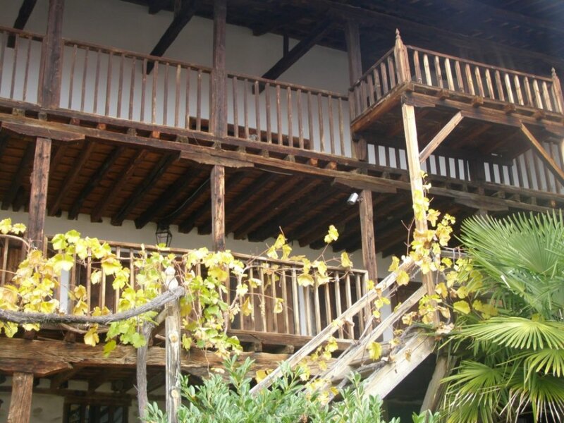 Wooden Balcony with Vines