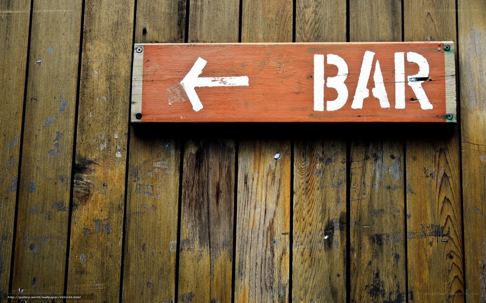 Wooden bar sign on wall